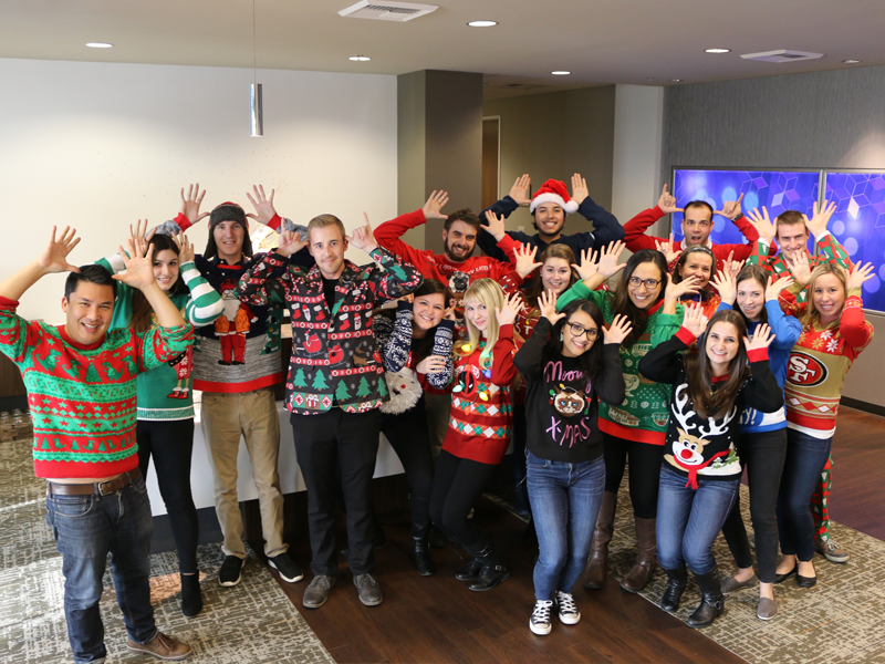 IA Staff in ugly holiday sweaters